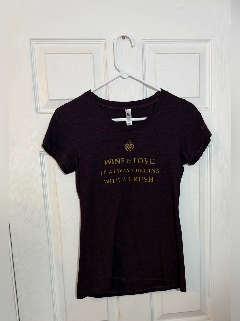Abella Black Short Sleeve Tee with Gold Wine Slogan